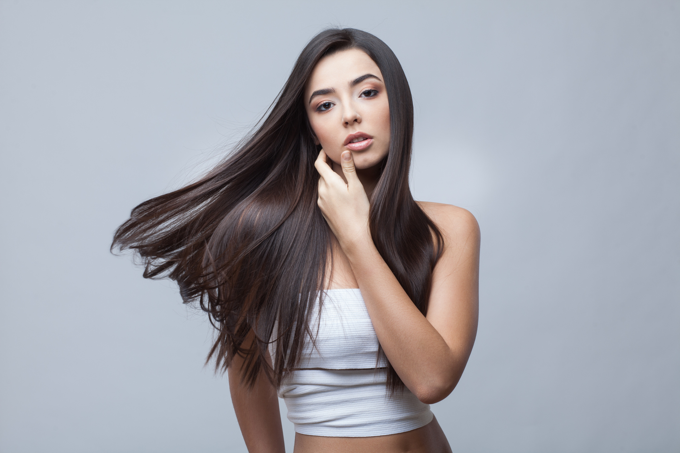 Beautiful Brunette Girl with Healthy Long Hair